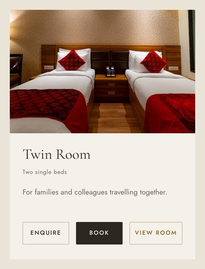 A room on the hotel’s site: the Twin Room, with Enquire, Book and View room under it.